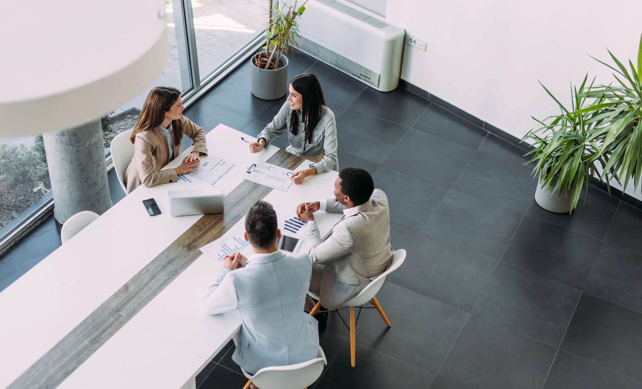Financial consulting team meeting in a modern office